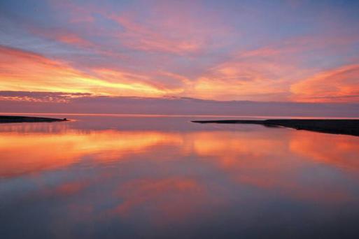 Sunrise on the Pike River and Lake Michigan